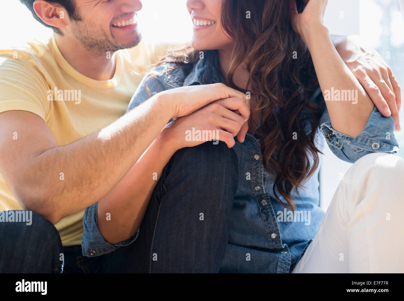 Smiling couple relaxing together Stock Photo