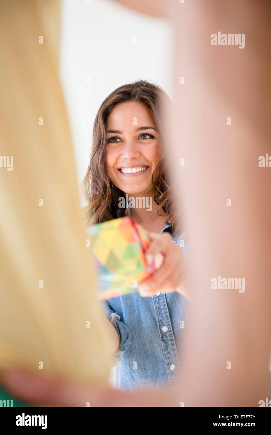 Woman giving boyfriend gift Stock Photo