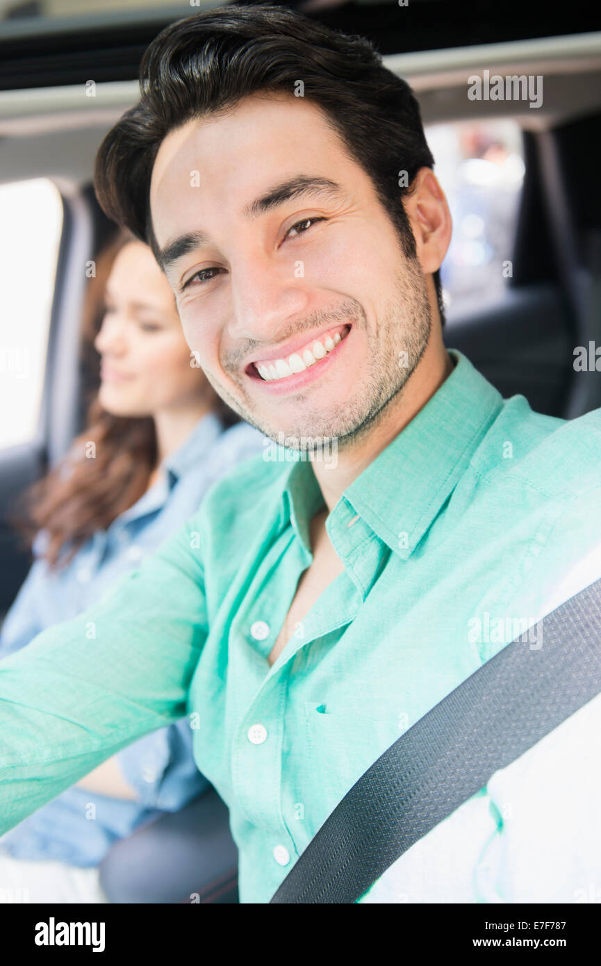 Man smiling in car Stock Photo - Alamy