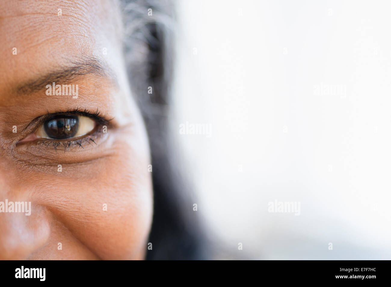 Close up of mixed race woman's eye Stock Photo