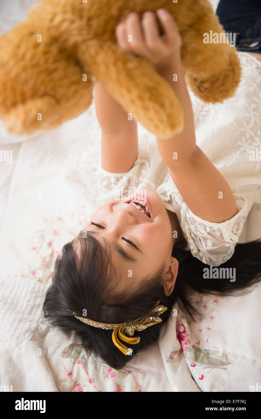 Black girl laying on bed hires stock photography and images Alamy