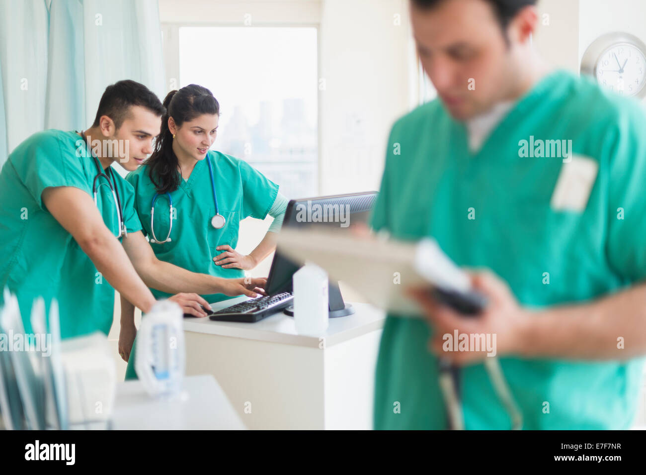 Hispanic nurses working in hospital Stock Photo
