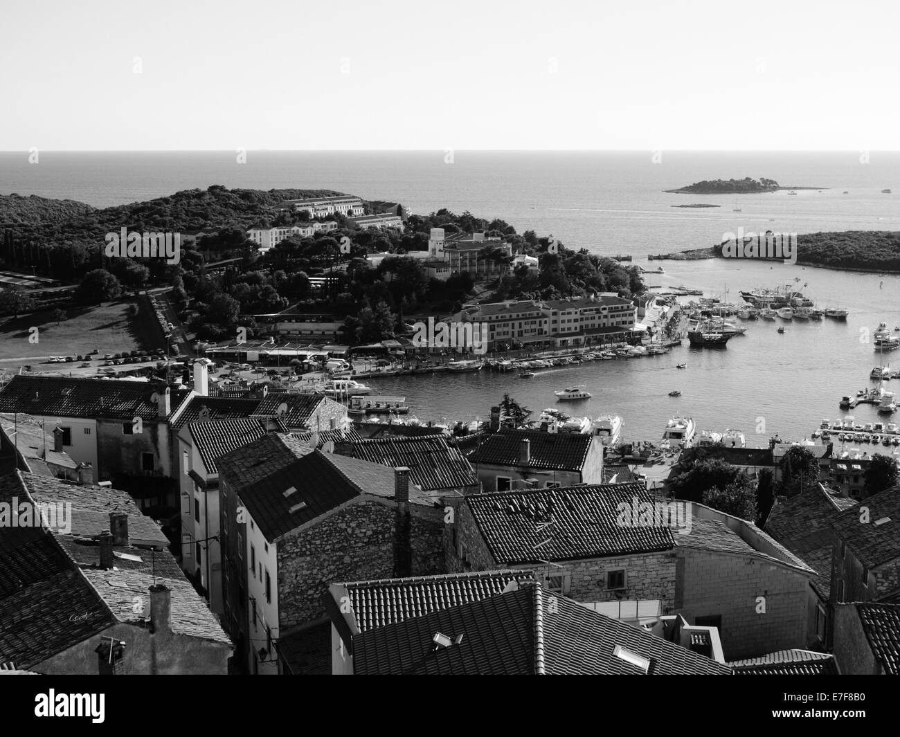 Vrsar port.  Both old and new city can be seen, along with parked boats and yachts Stock Photo