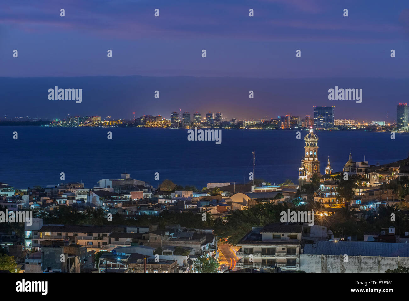 Aerial view of illuminated cityscape and skyline at dusk Stock Photo
