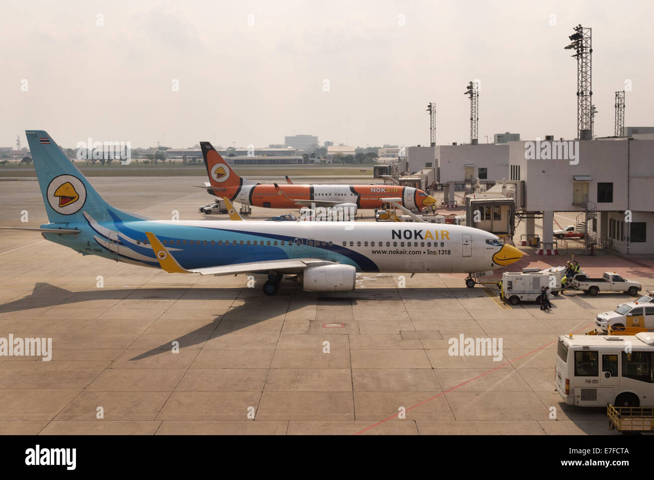 NokAir planes at Don Mueang International Airport Bangkok, Thailand Stock Photo
