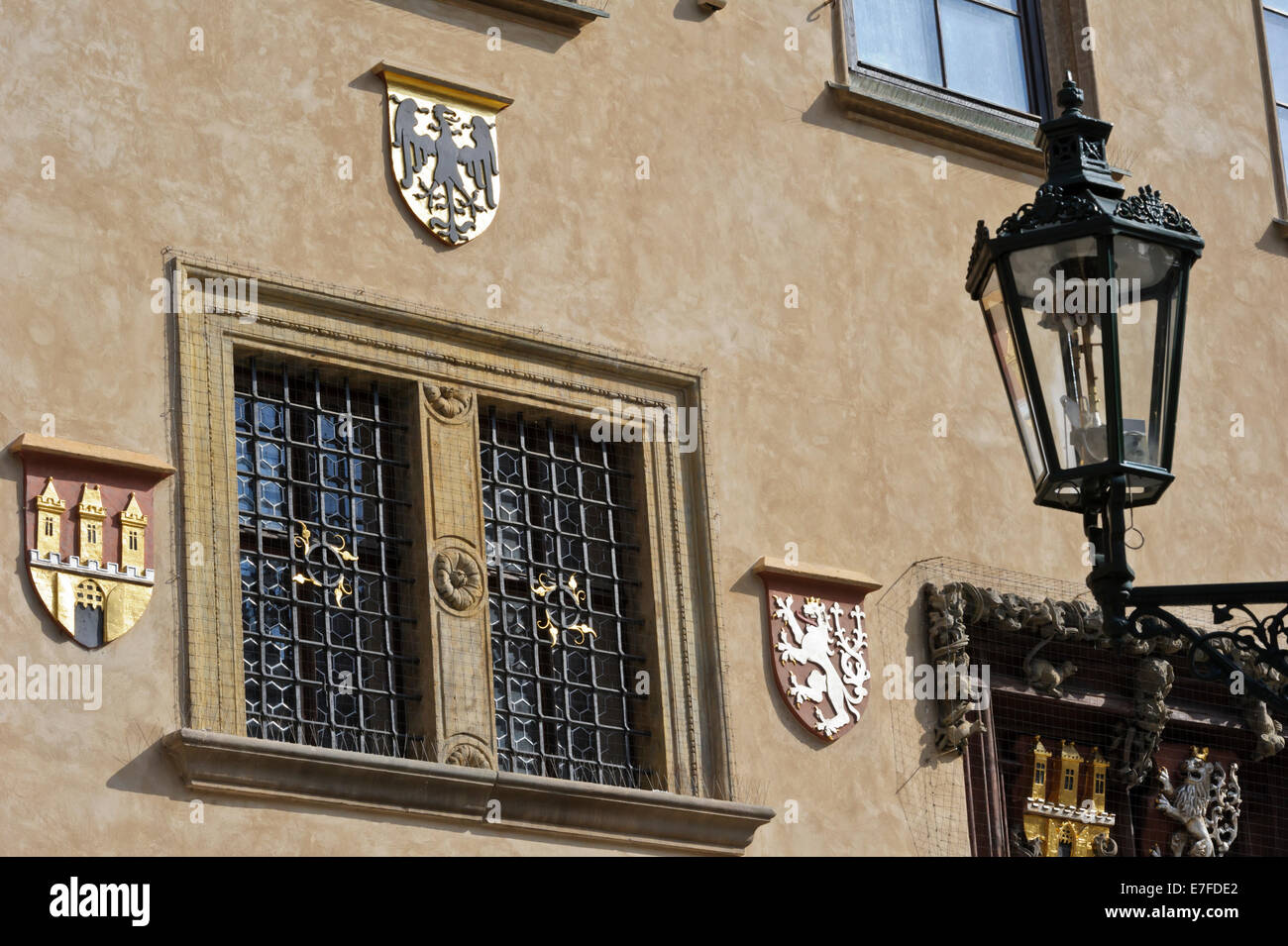 The windows of the Old Town Hall in Prague are decorated with a large selection of Coat of Arms, Prague, Czech Republic. Stock Photo