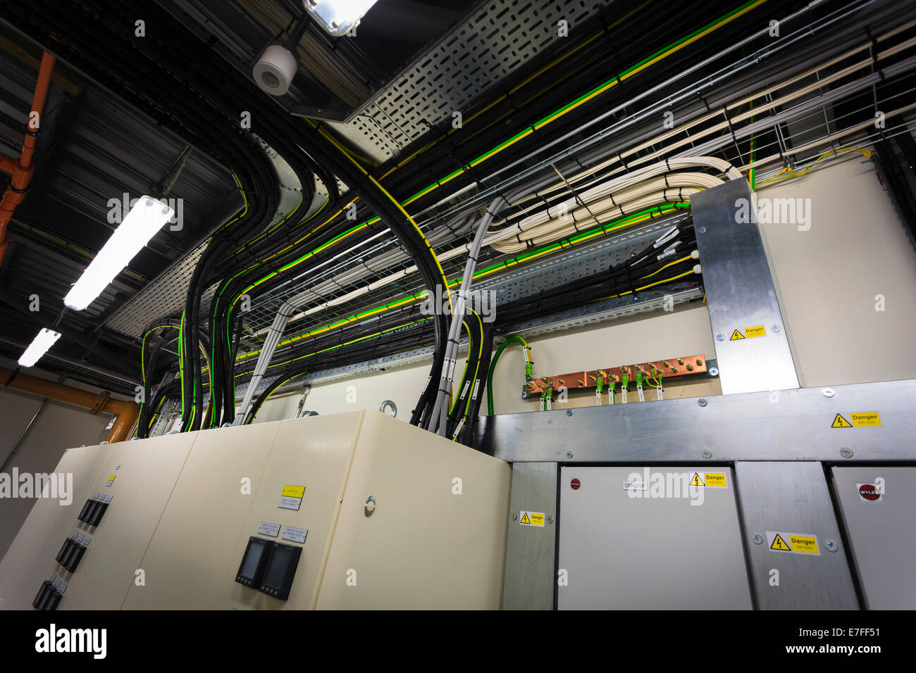 Cabling to electrical control boxes in plant room Stock Photo - Alamy