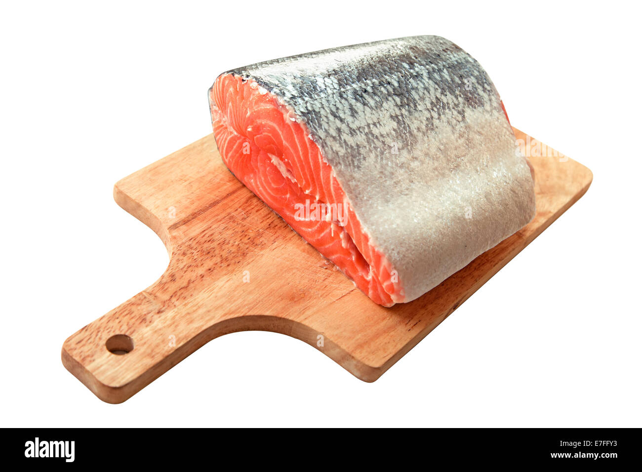 Salmon on a cutting board isolated over white background Stock Photo