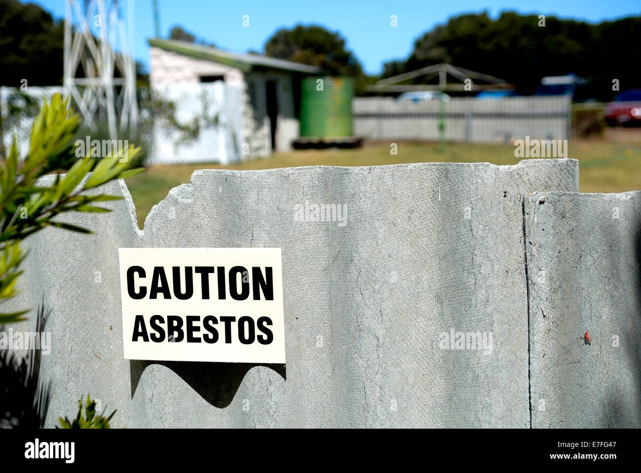 "Caution Asbestos" sign on broken asbestos fence. Busselton, Western