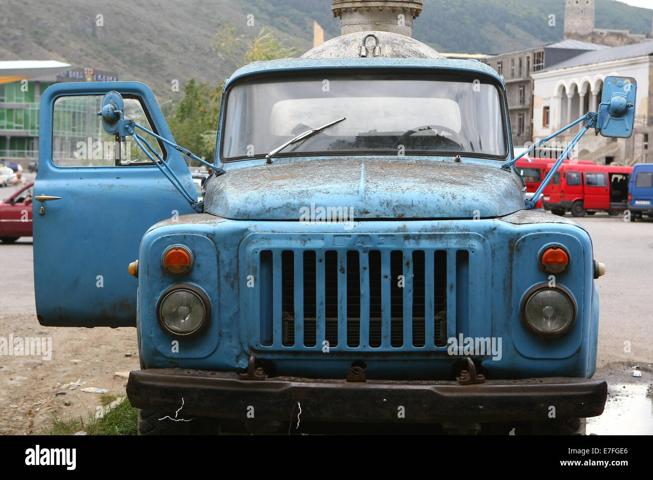 Old blue russian truck in the Georgian city of Vardzia Stock Photo