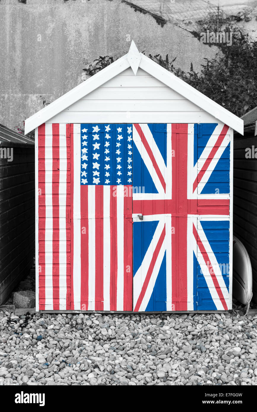 English beech hut with Union Jack and Stars and stripes painted on the front Stock Photo