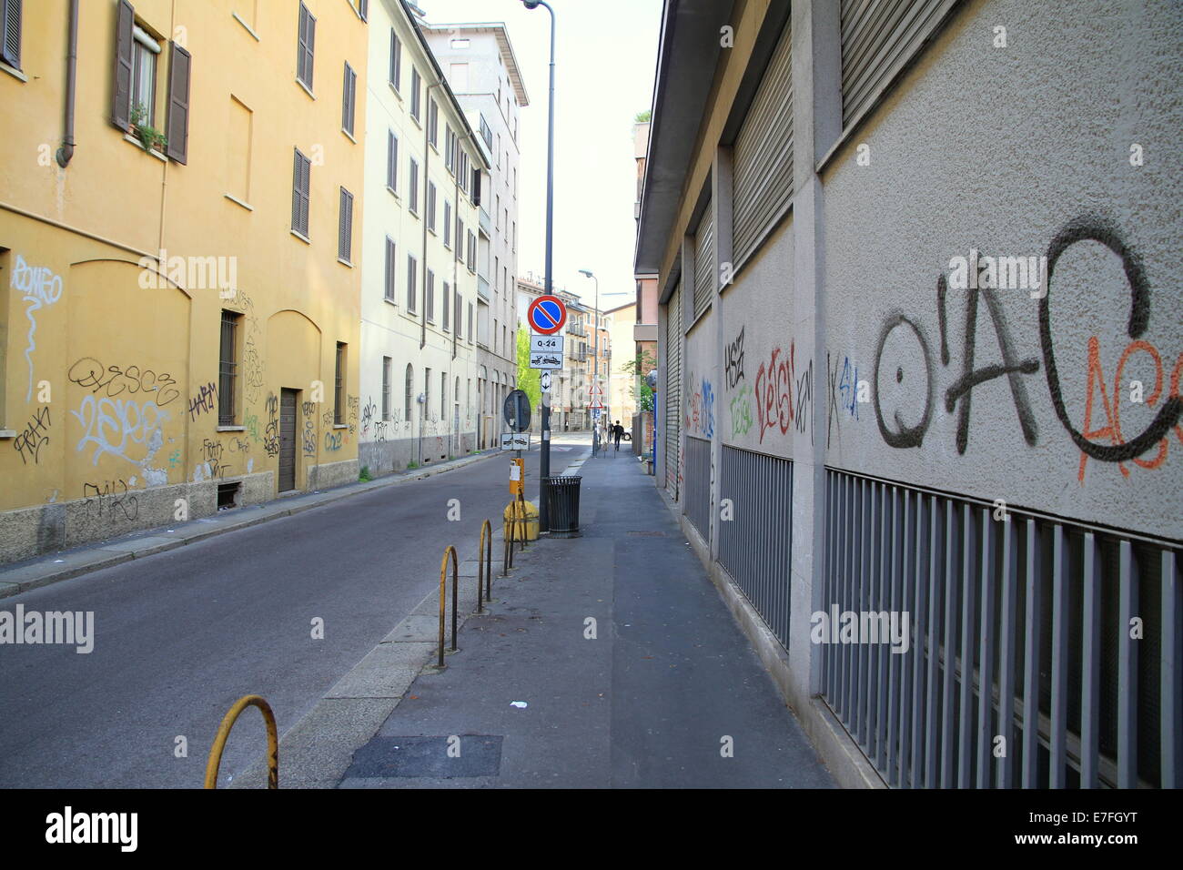 Graffiti and urban decay in a street in Milan, Italy Stock Photo