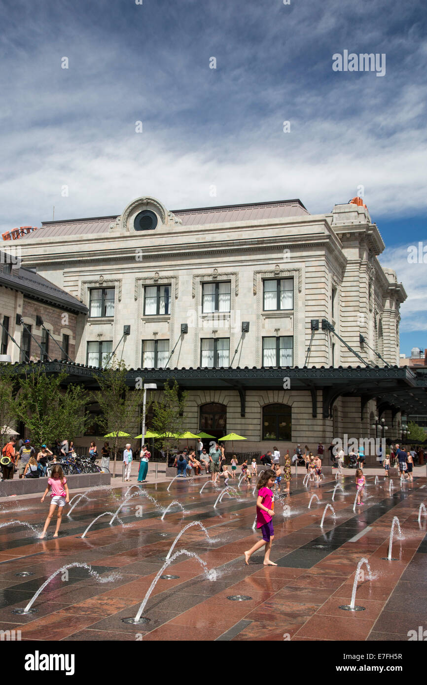 Denver, Colorado - Children play in fountains outside Denver's historic Union Station. Stock Photo