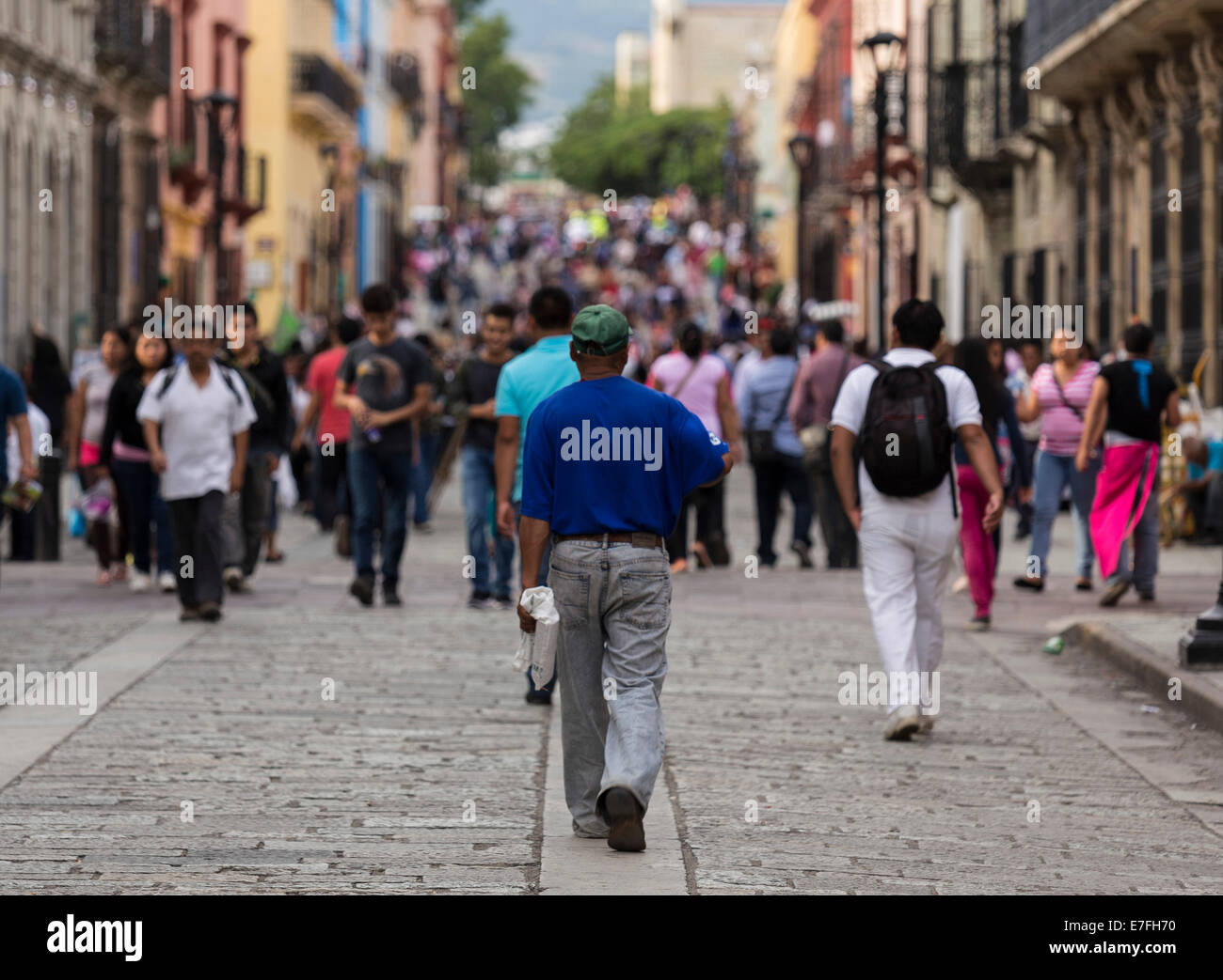 People walking on the streets of Oaxaca, Mexico Stock Photo