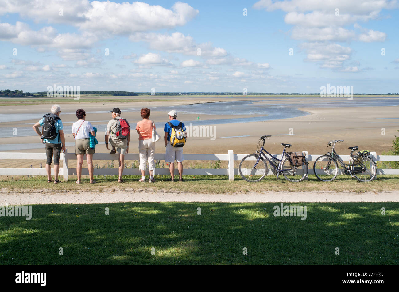 Visitors looking out over the Baie de Somme, Le Crotoy, Picardie, France, Europe Stock Photo