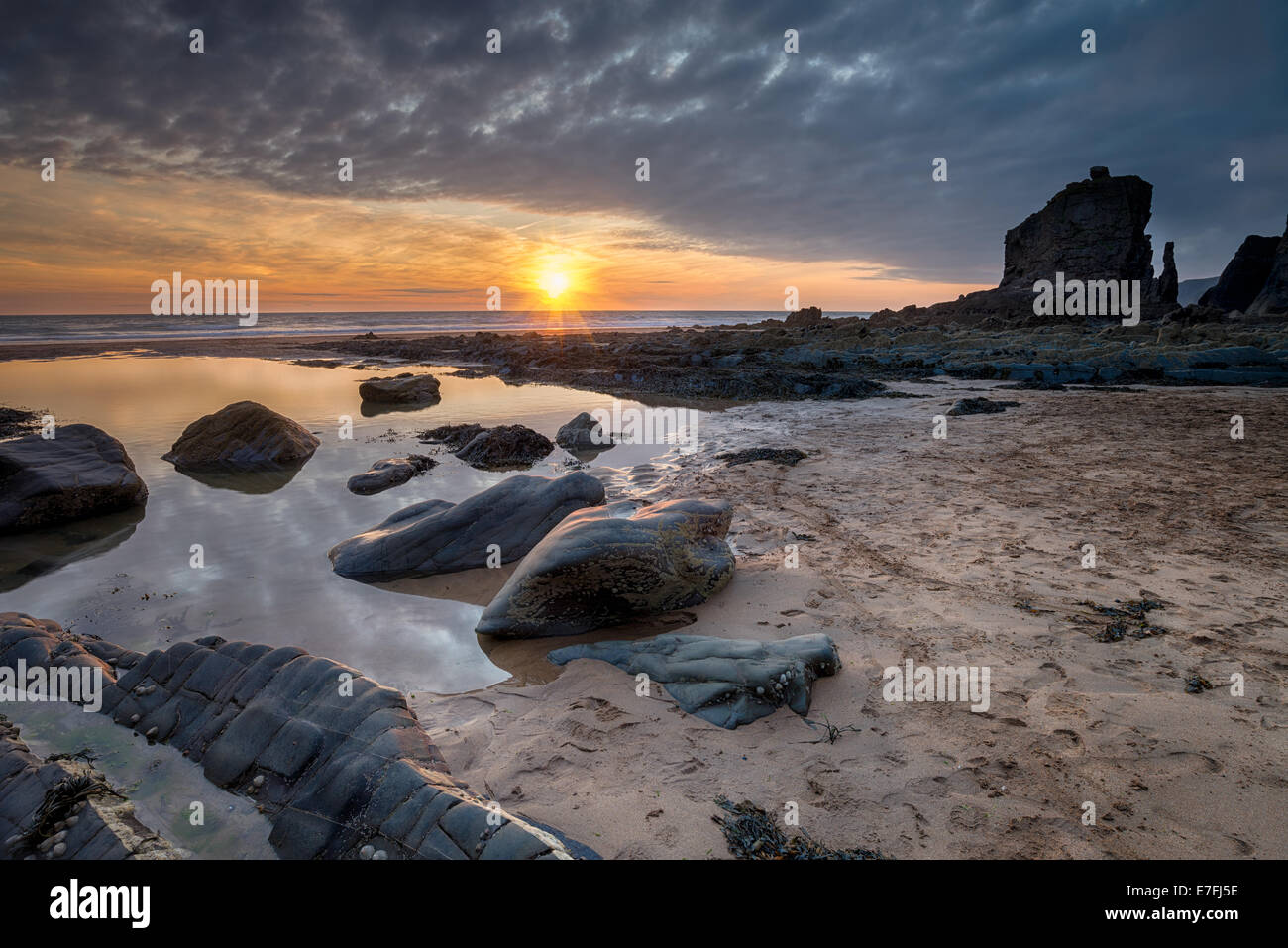 Beautiful sunset at Sandymouth Beach near Bude on the Devon and Cornwall border Stock Photo