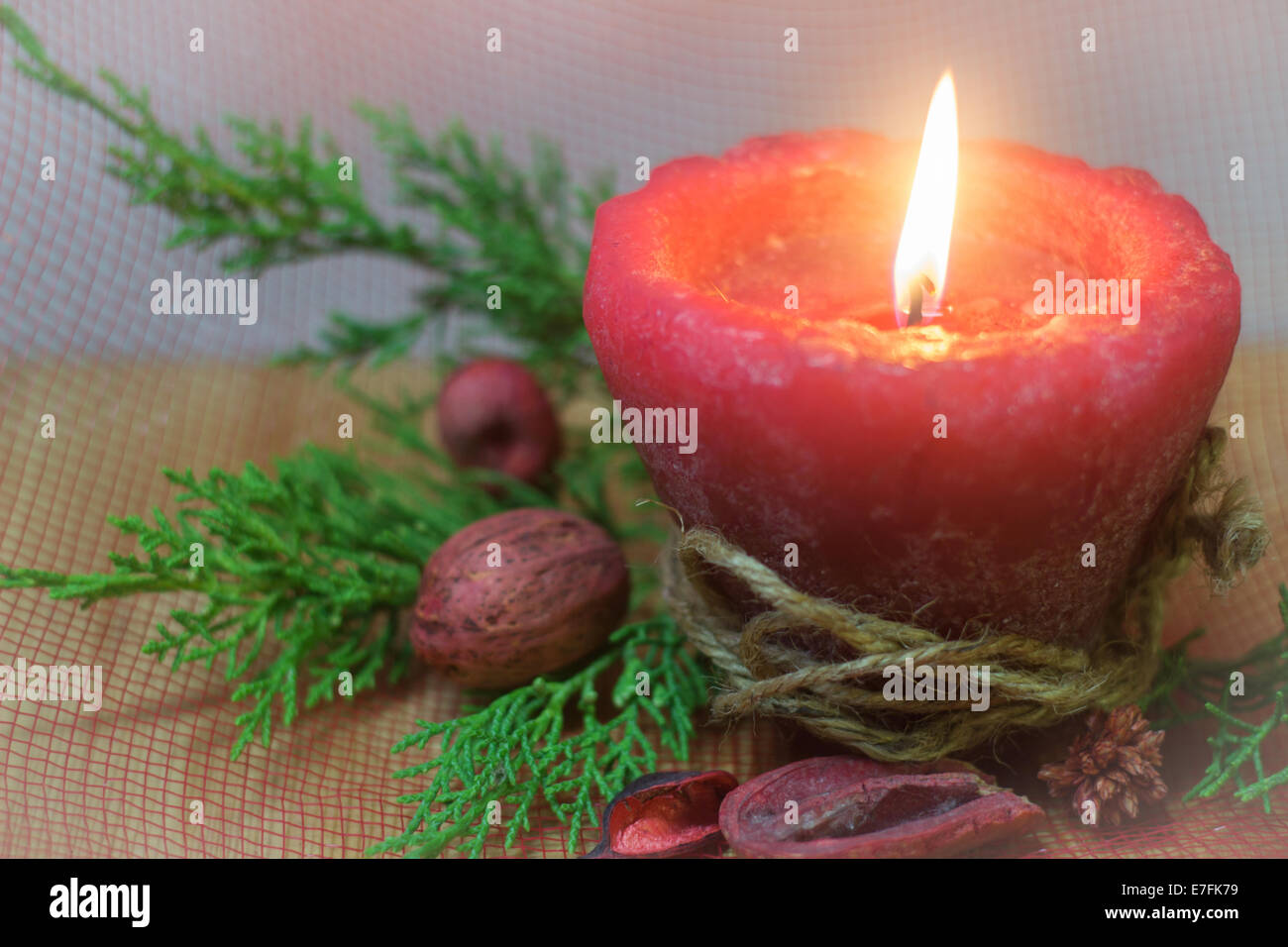 Christmas candle red flame fire horizontal pine fir decorations holiday festive nobody Stock Photo