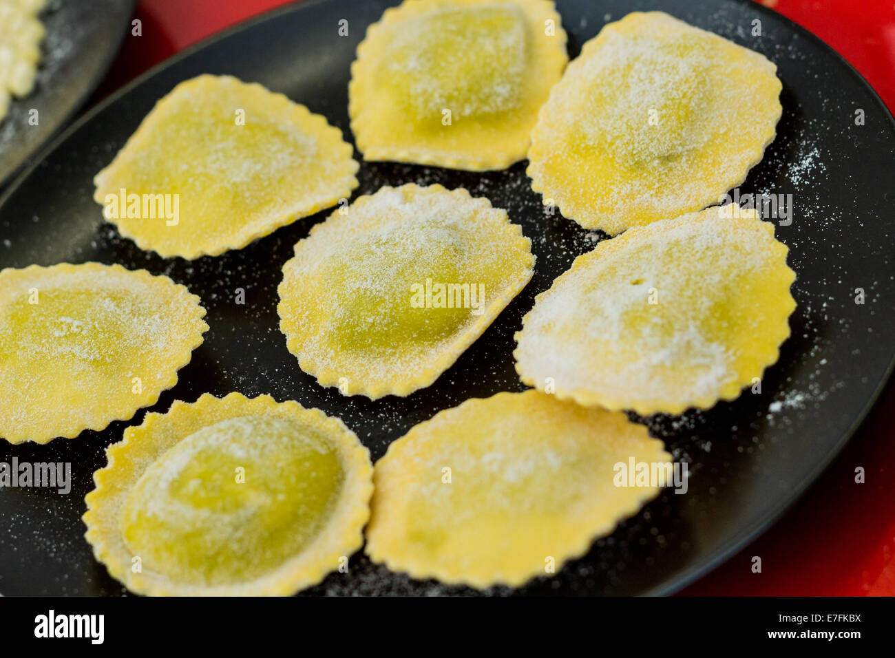 Raw ravioli pasta ready to cook Stock Photo - Alamy