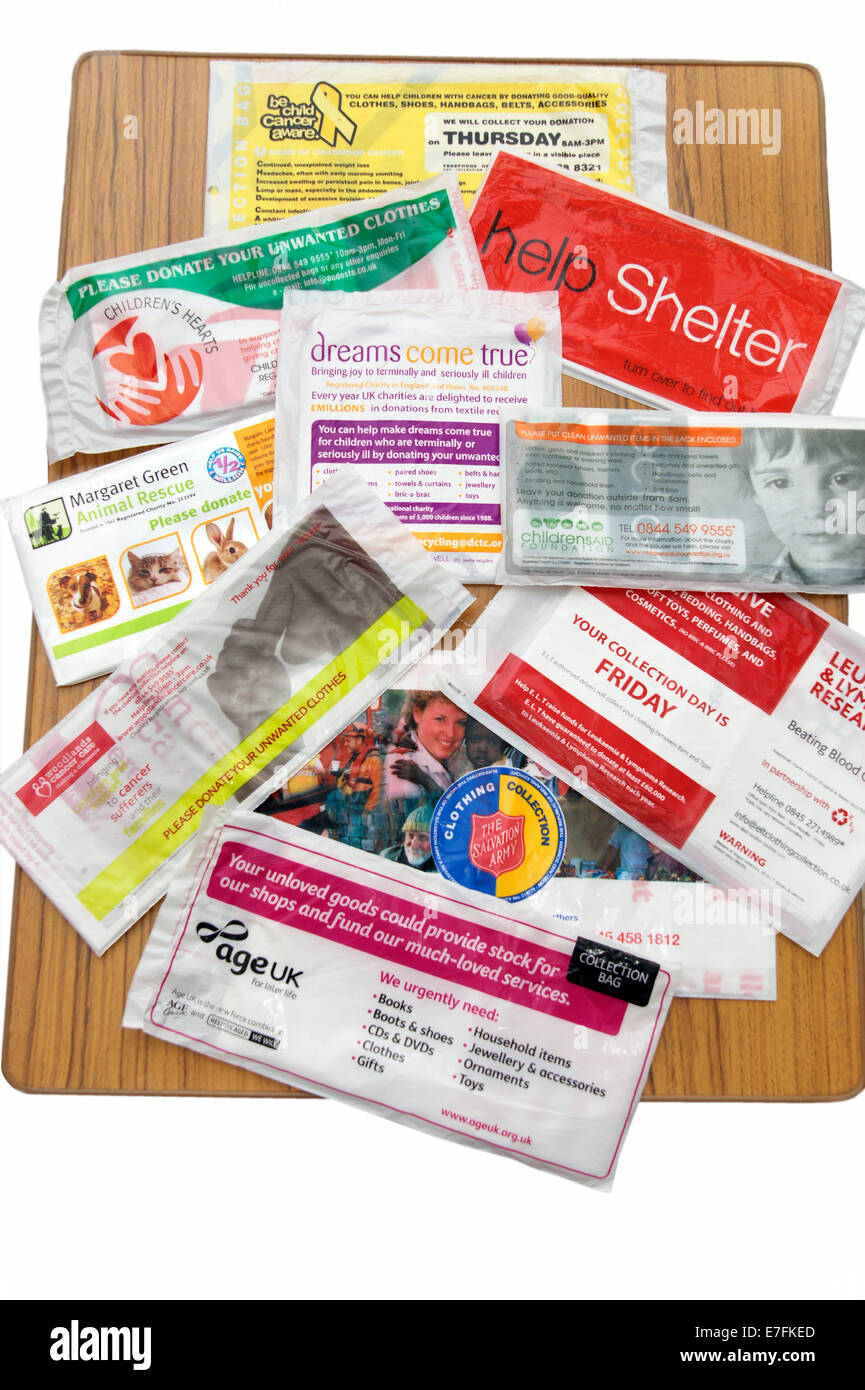 A mixture of charity collection bags Stock Photo