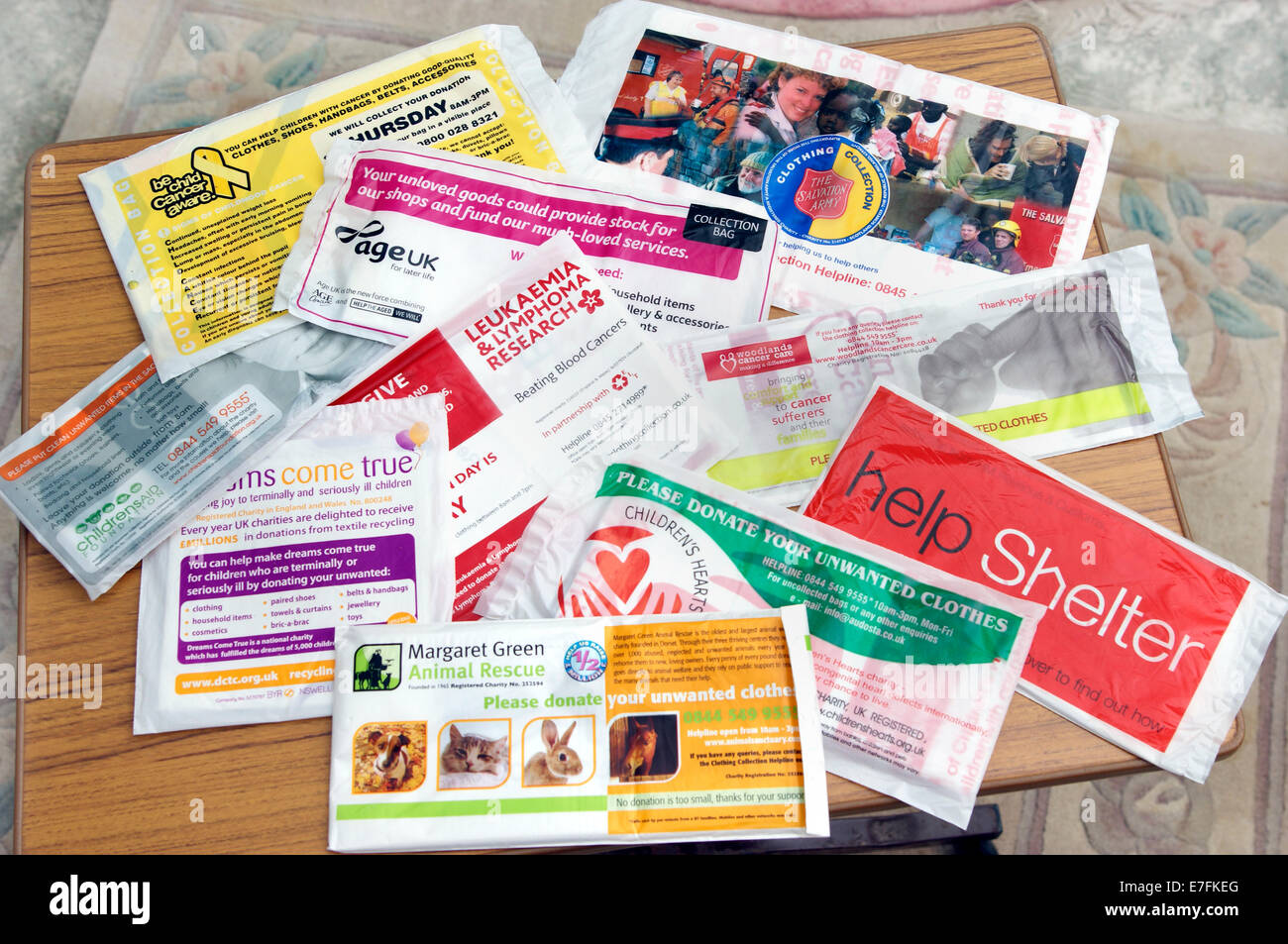 A mixture of charity collection bags Stock Photo