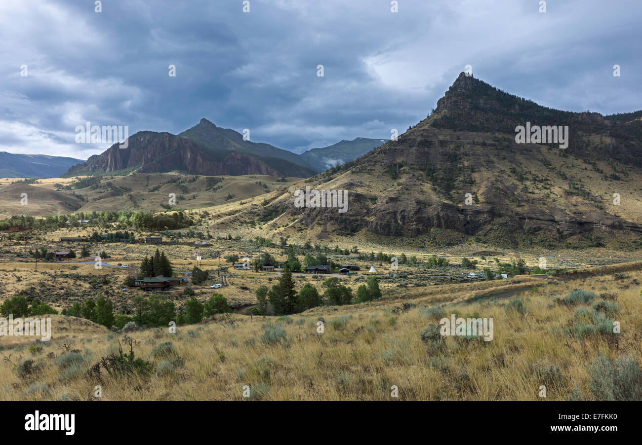 Small community set against the high rocky mountains and surrounded by scrub land in the heart of Buffalo Bill State Park. Stock Photo