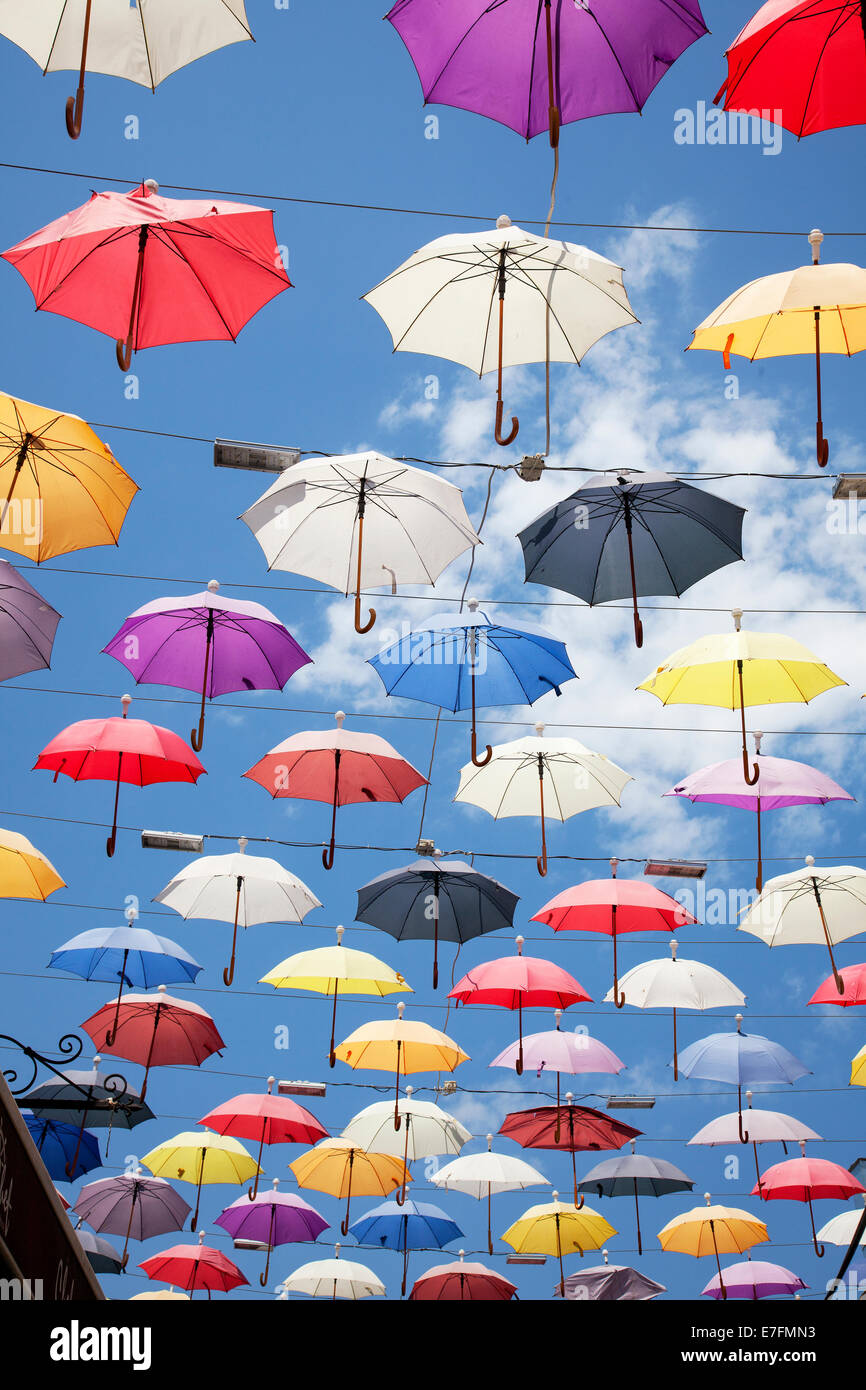 Hanging umbrellas in a street Stock Photo Alamy