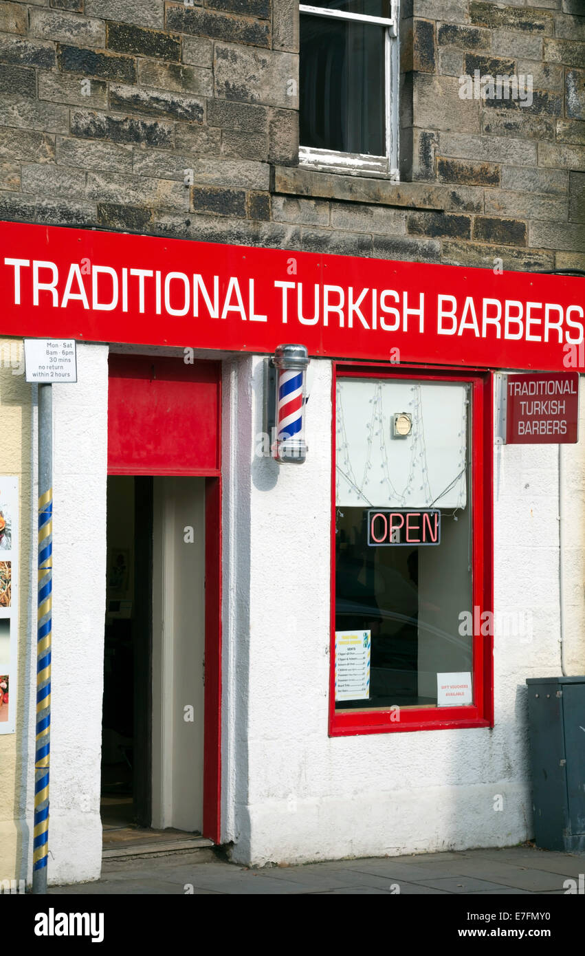 A traditional Turkish barbershop operating on the high street in a Scottish village near Edinburgh. Stock Photo