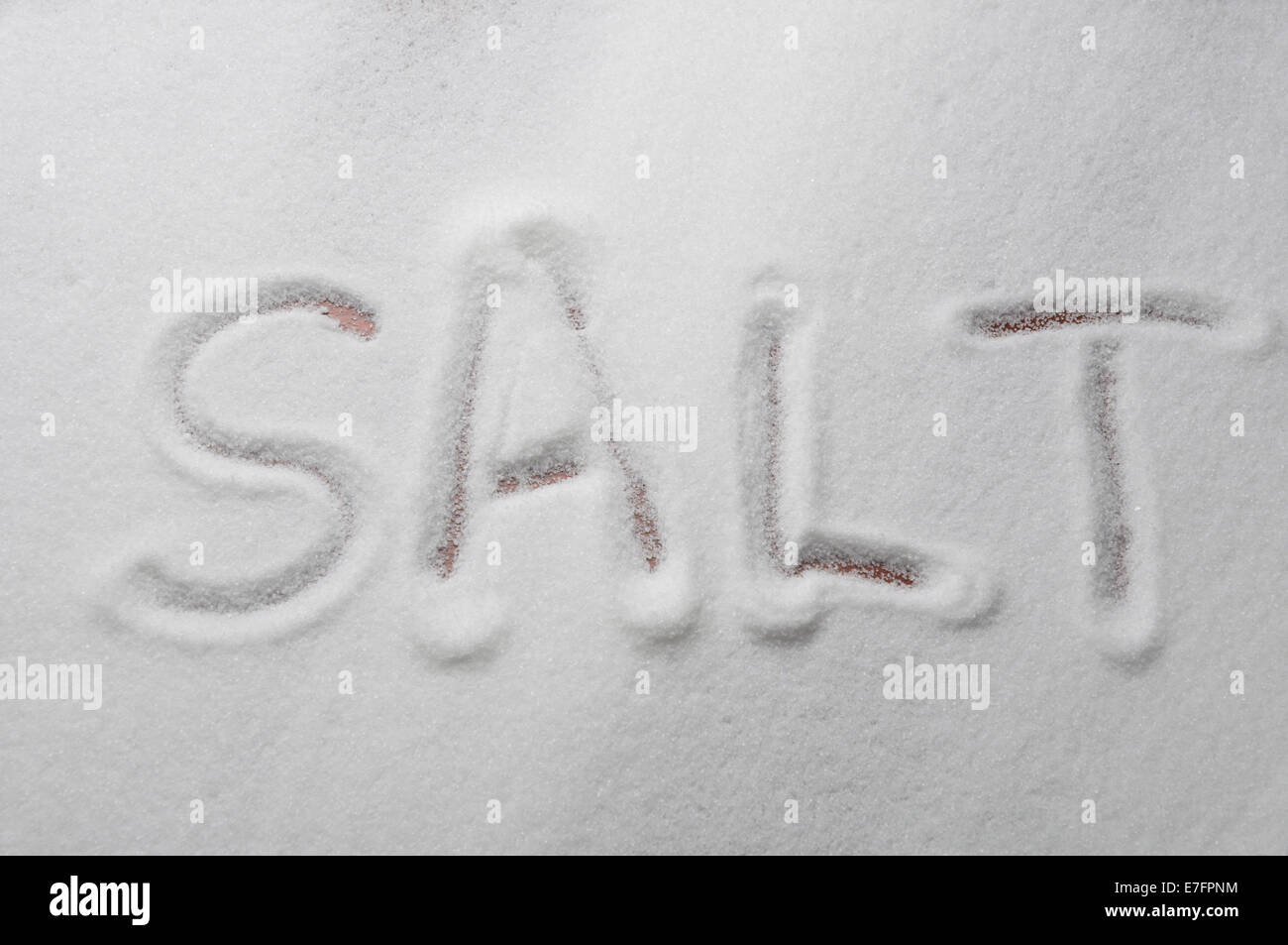 Salt written in Salt Stock Photo - Alamy
