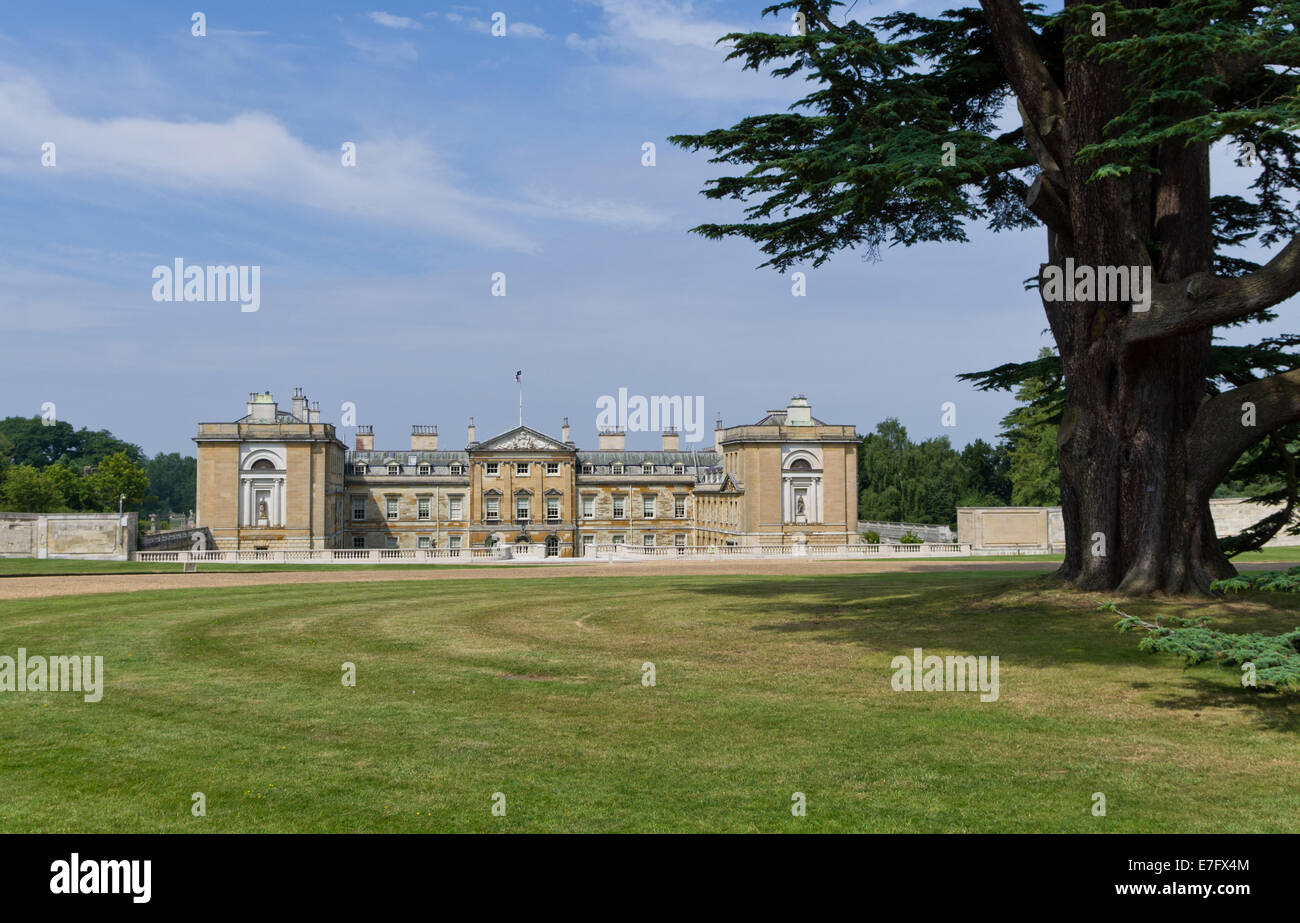 A rear view of Woburn Abbey, Bedfordshire; an old tree in the foreground. Stock Photo