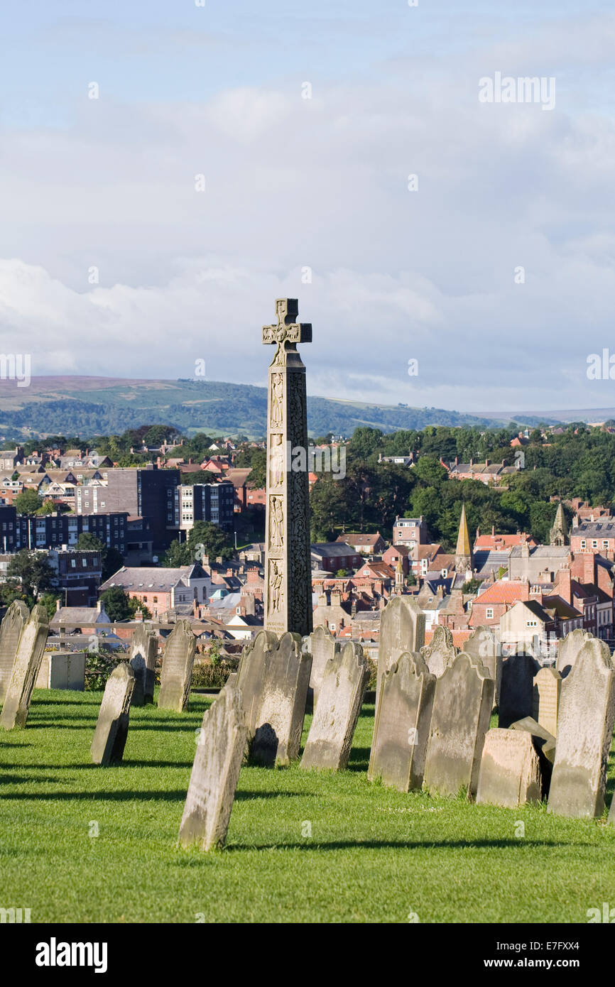 Monument to Caedmon, Whitby, in the grounds of St. Mary's Church. Stock Photo