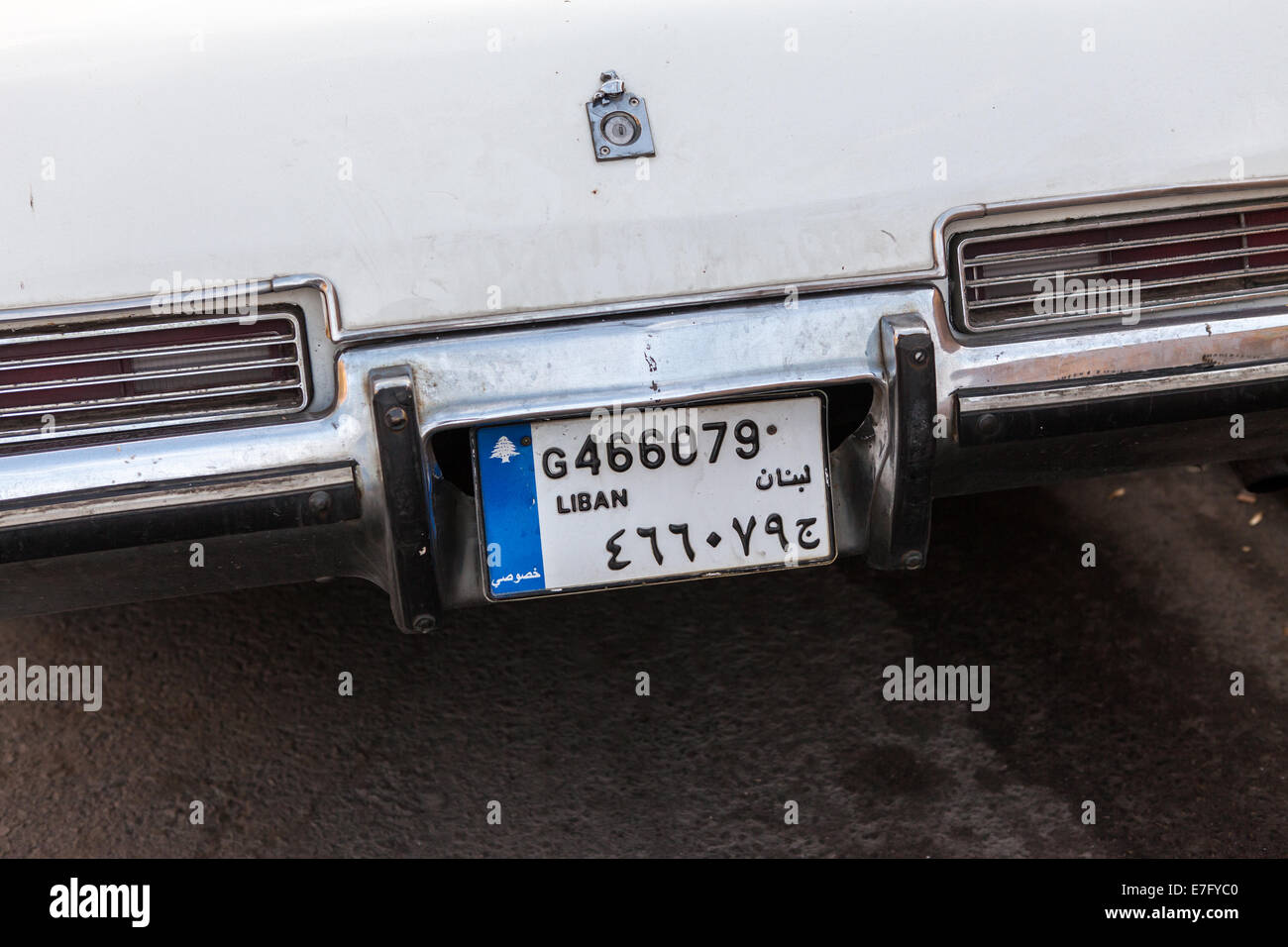 A classic white car with a Lebanese license plate, in Beirut Central District (Downtown), Lebanon. Stock Photo