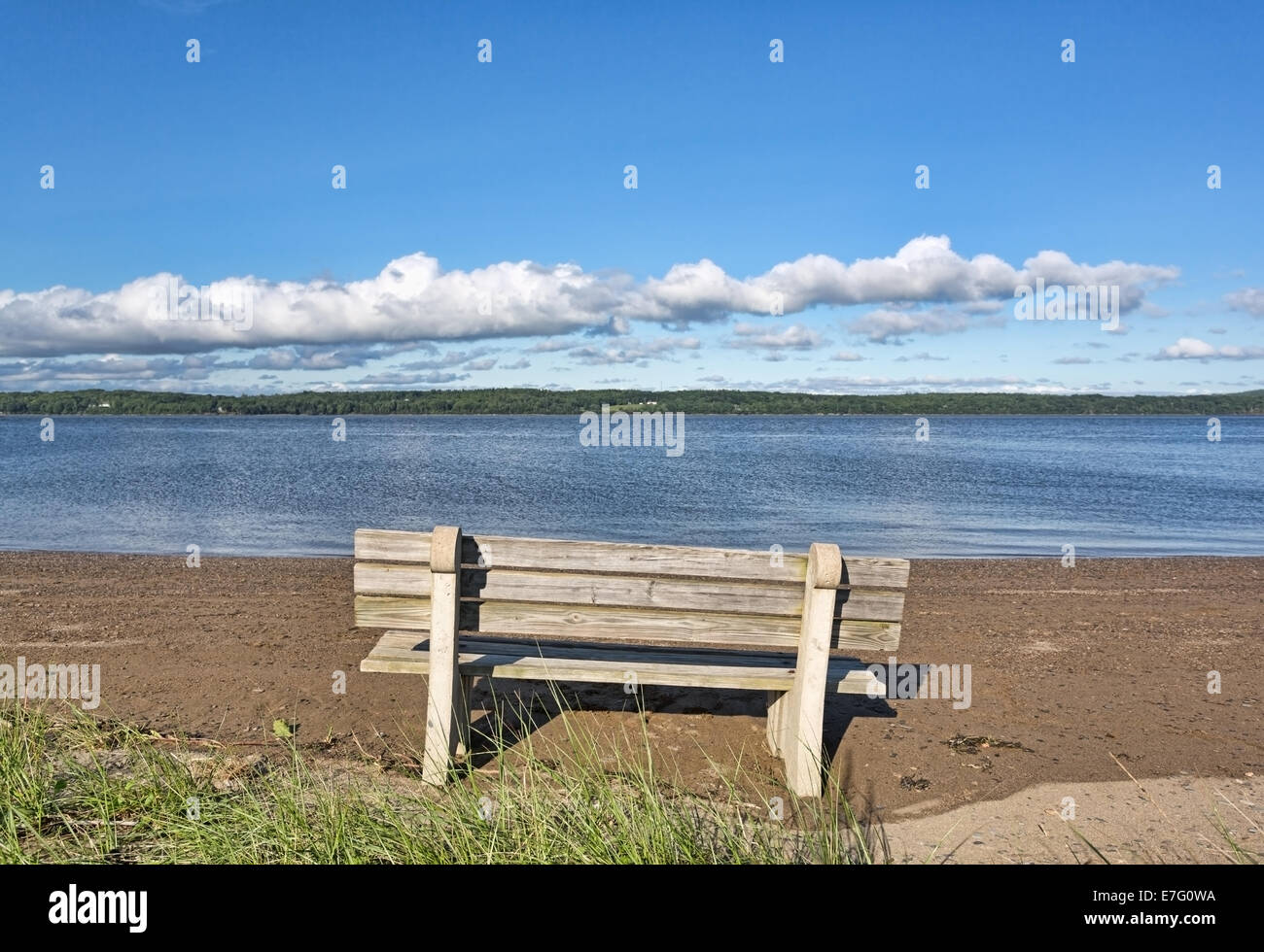 An old bench facing the Penobscot River at Sandy Point Beach in