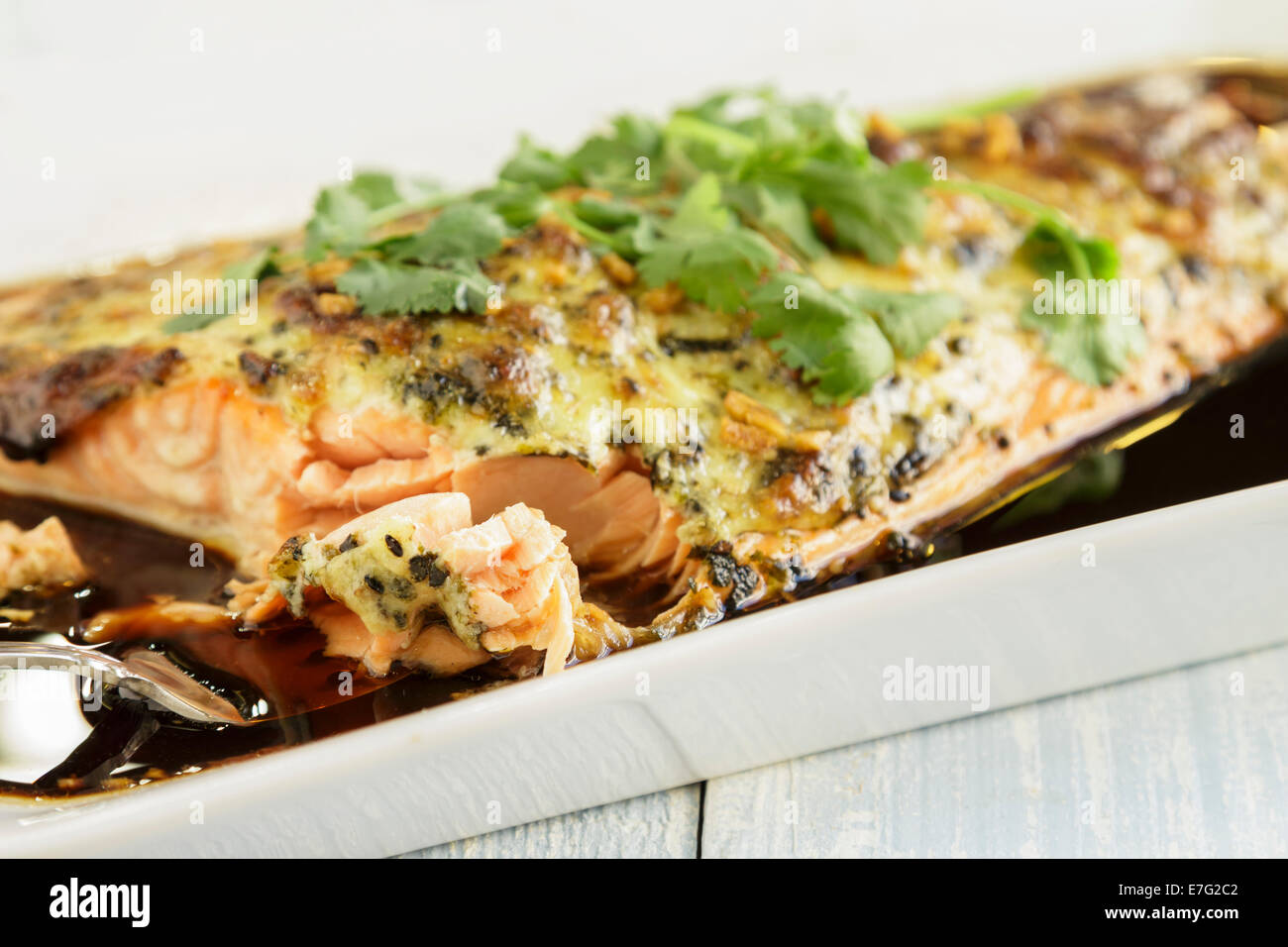 Salmon rubbed and baked with a mixture of mayonnaise, wasabi and