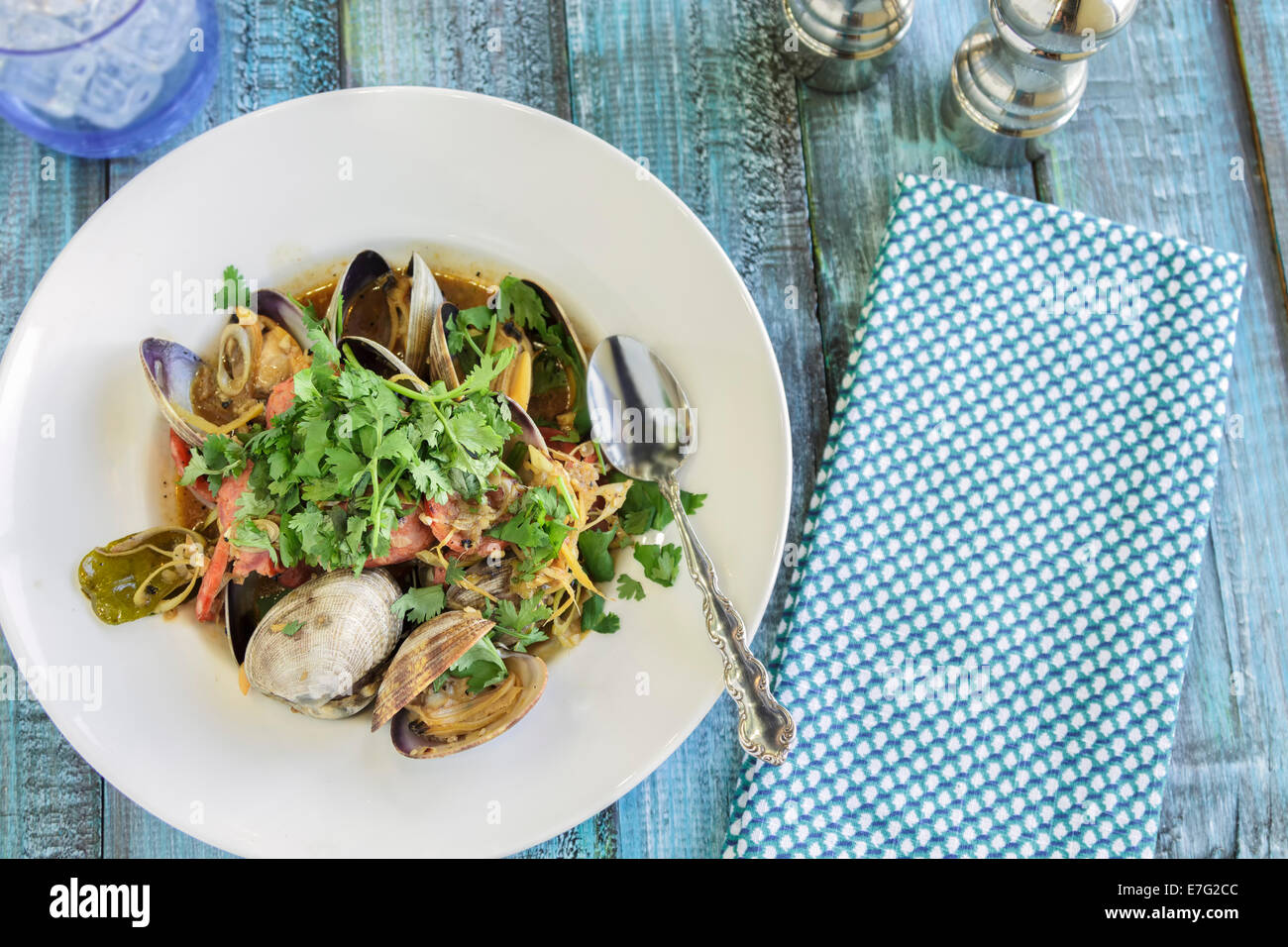 Clams and Portuguese sausage stirfried with garlic, ginger and