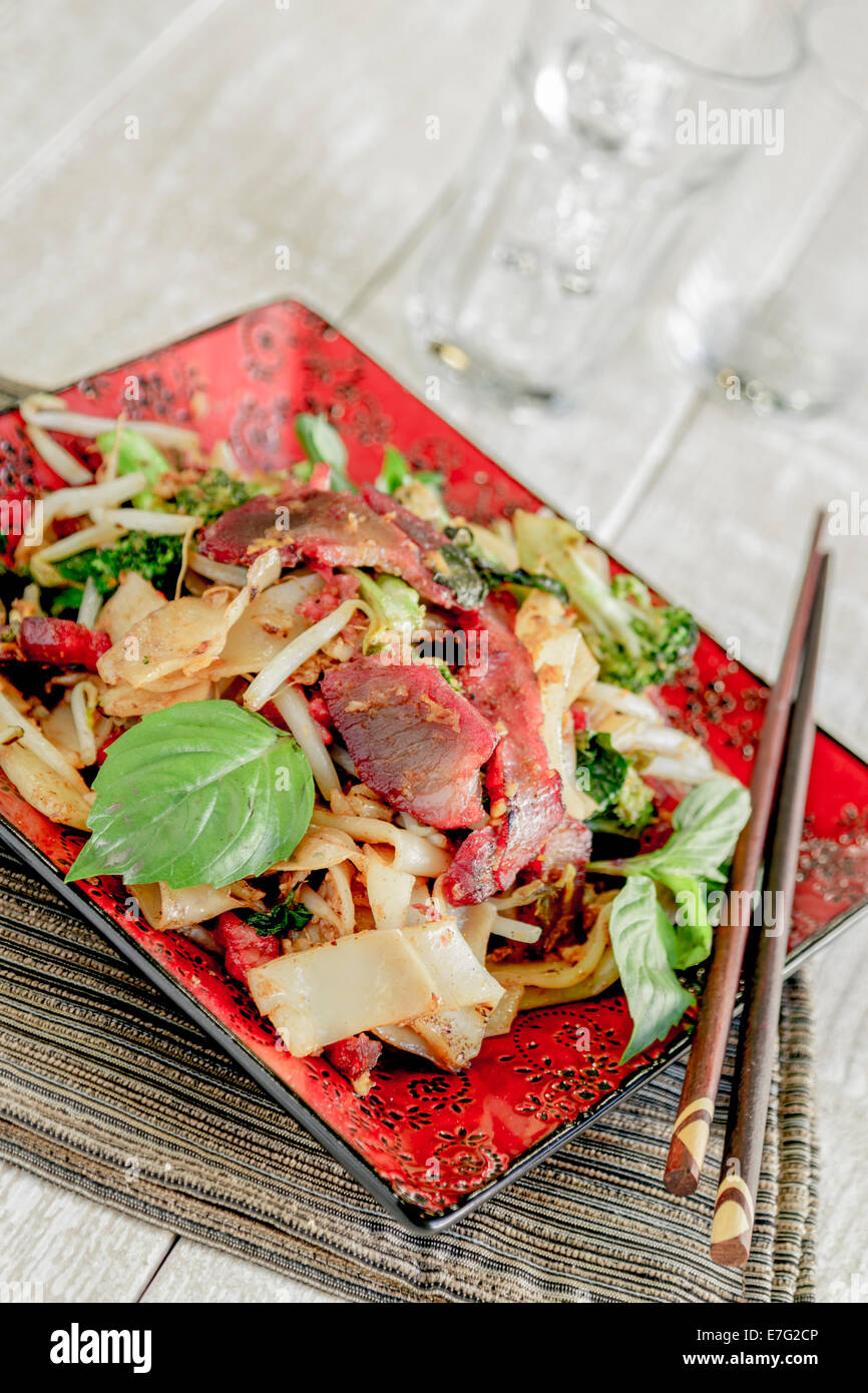 Pad Ki Mao with char siu pork, broccoli, noodles and bean sprouts