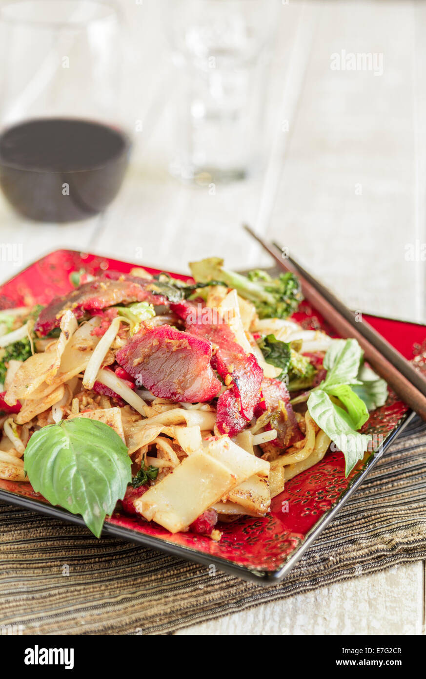 Pad Ki Mao with char siu pork, broccoli, noodles and bean sprouts
