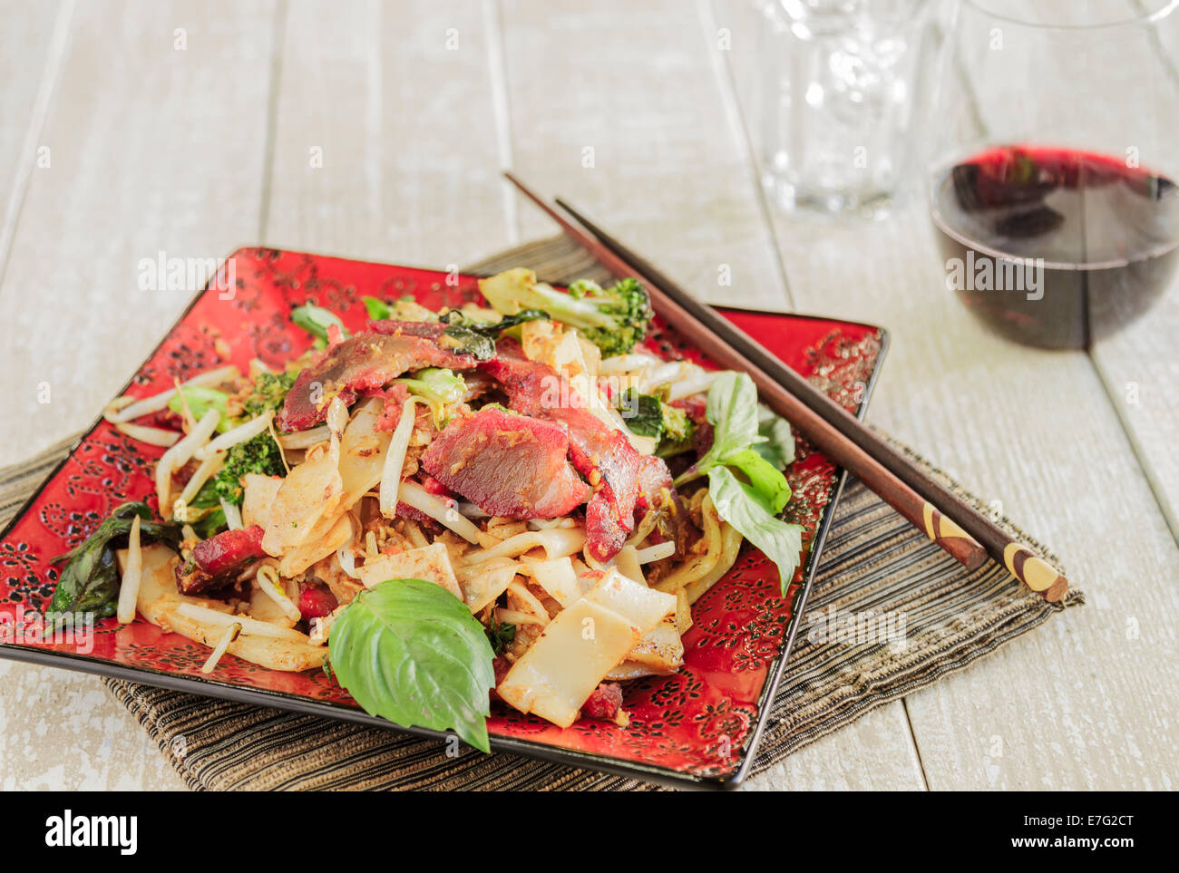 Pad Ki Mao with char siu pork, broccoli, noodles and bean sprouts