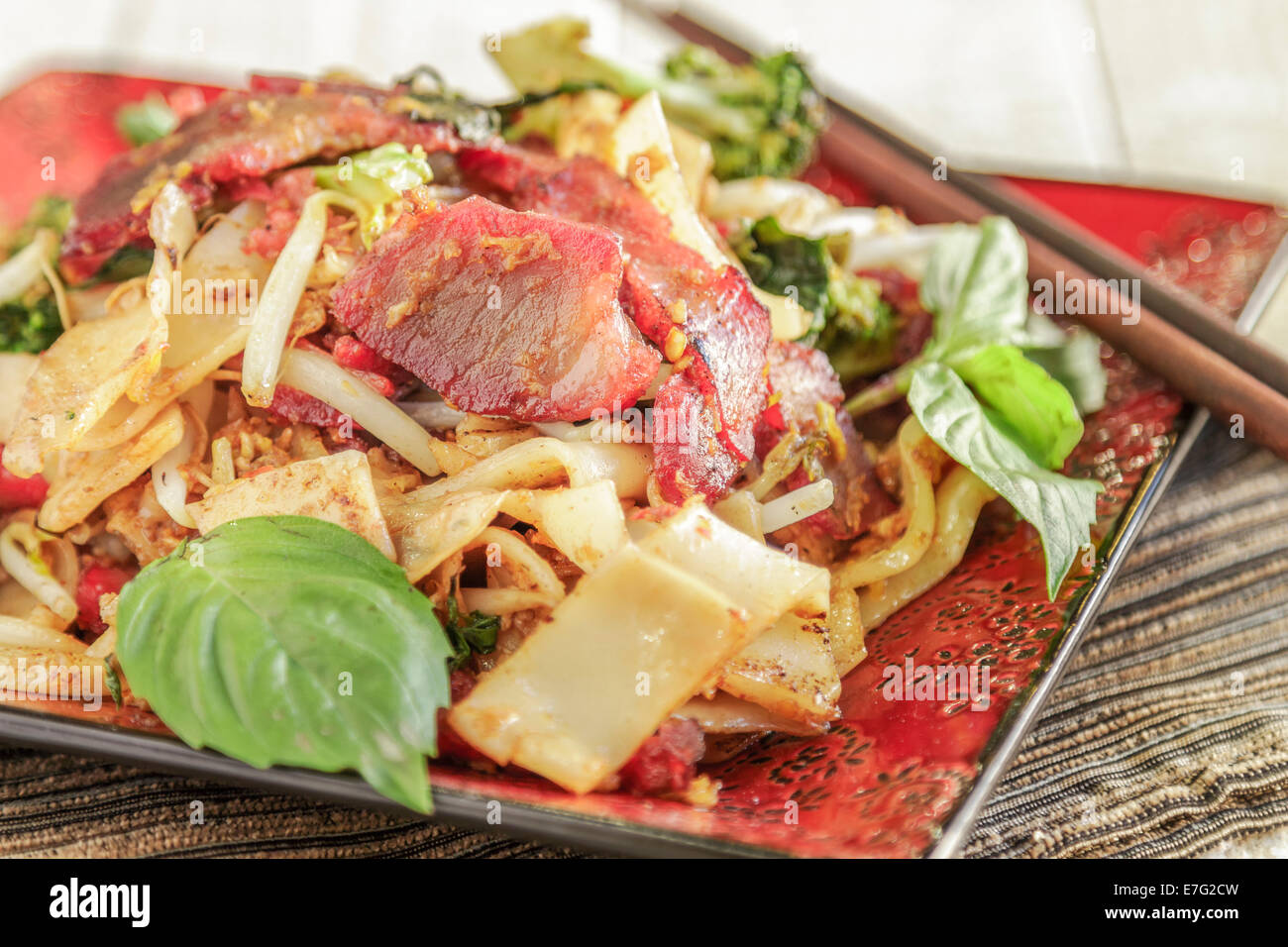 Pad Ki Mao with char siu pork, broccoli, noodles and bean sprouts