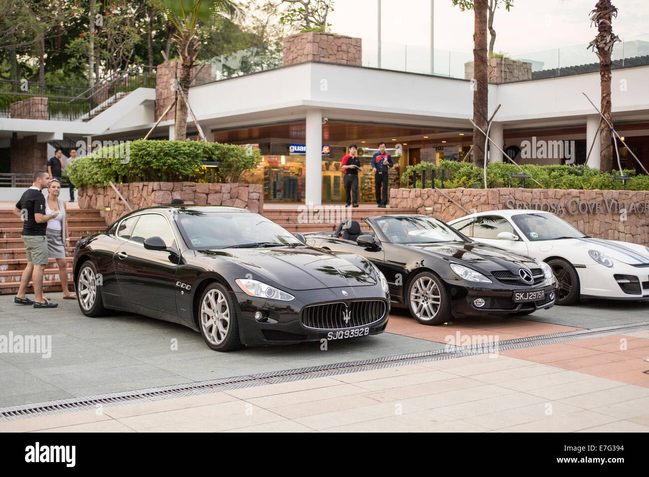 luxury supercars parked at Sentosa Cove, during the Singapore Yacht Show 2014 Stock Photo