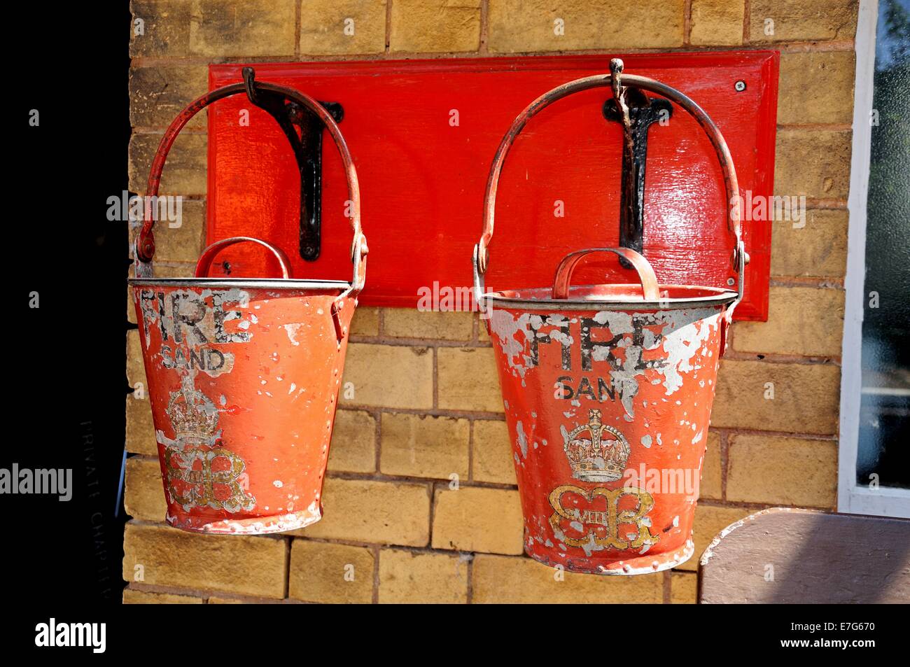 Old Retro Victorian fire sand buckets, Severn Valley Railway, Arley, Worcestershire, England, UK, Western Europe. Stock Photo