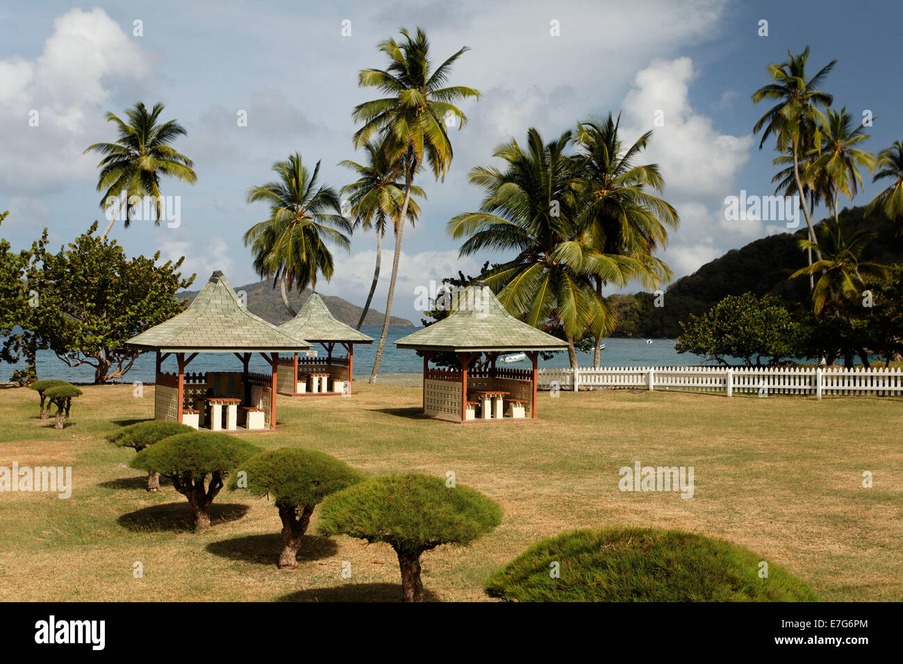 Barbecue huts on the beach, coconut trees, Speyside, Tobago, Trinidad and Tobago Stock Photo