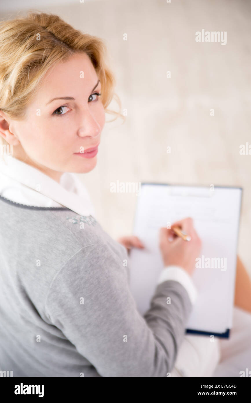 Professional psychiatrist looking at camera during therapy session Stock Photo Alamy
