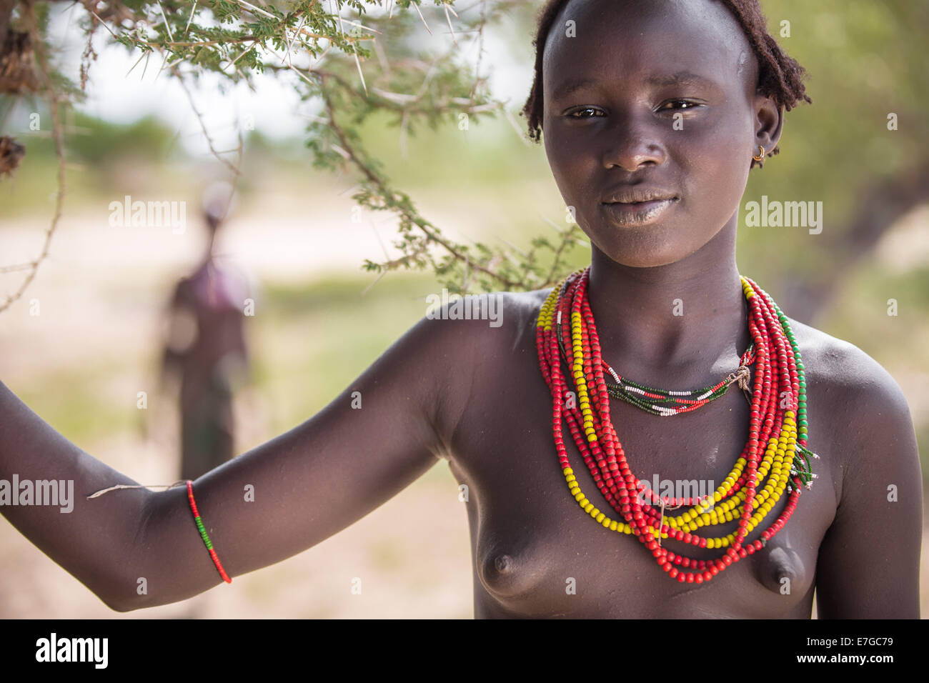 Dassanetch girl with traditional clothing in southern Ethiopia, Ethiopia 13 May 2014. Stock Photo