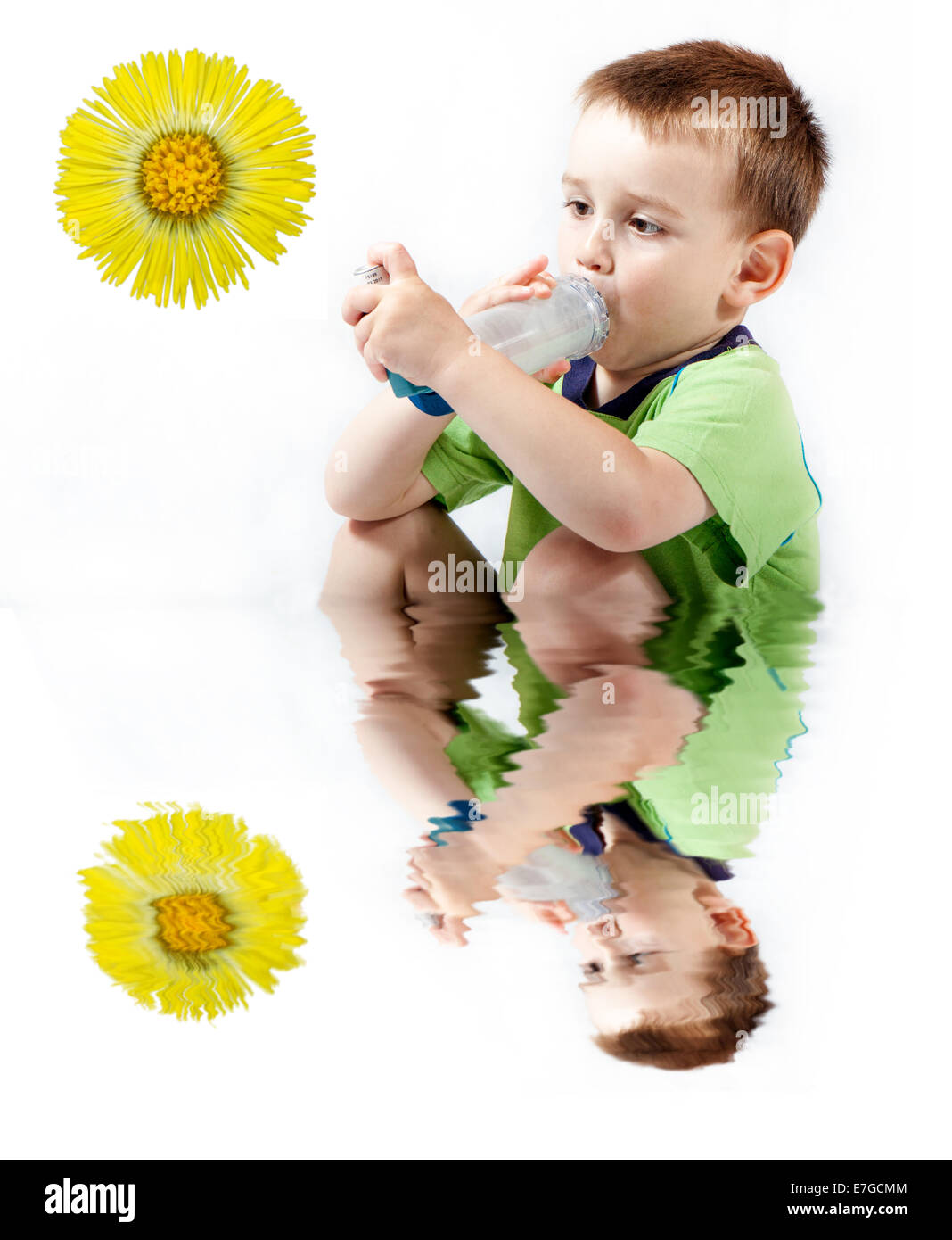 Little boy using inhaler for asthma isolated on white background Stock Photo