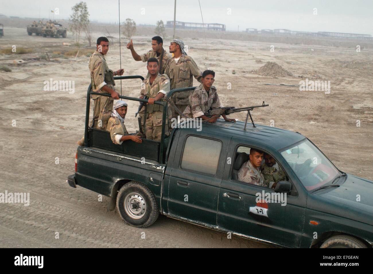 Patrol of the New Iraqi Army on the highway from Baghdad to Basra, near the city of Nasiriyah Stock Photo