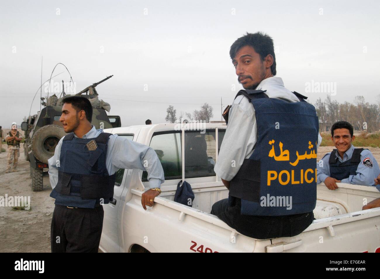 Police patrol on the highway from Baghdad to Basra, near the city of ...