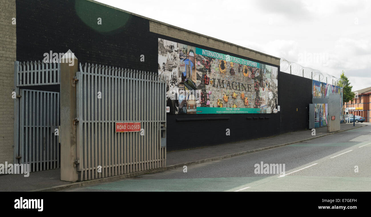 Passage in Peace Wall between catholic Falls Road and protestant Shankill Road, 12.08.2014 Stock Photo