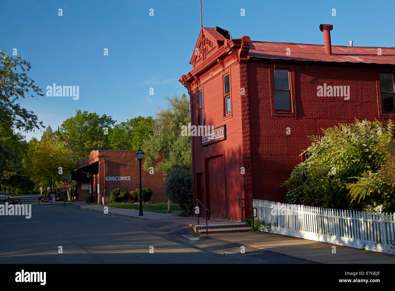 Fire House (1911, at right), and Columbia Mercantile Building (1855), Main Street, Columbia State Historic Park, Columbia, Tuolu Stock Photo