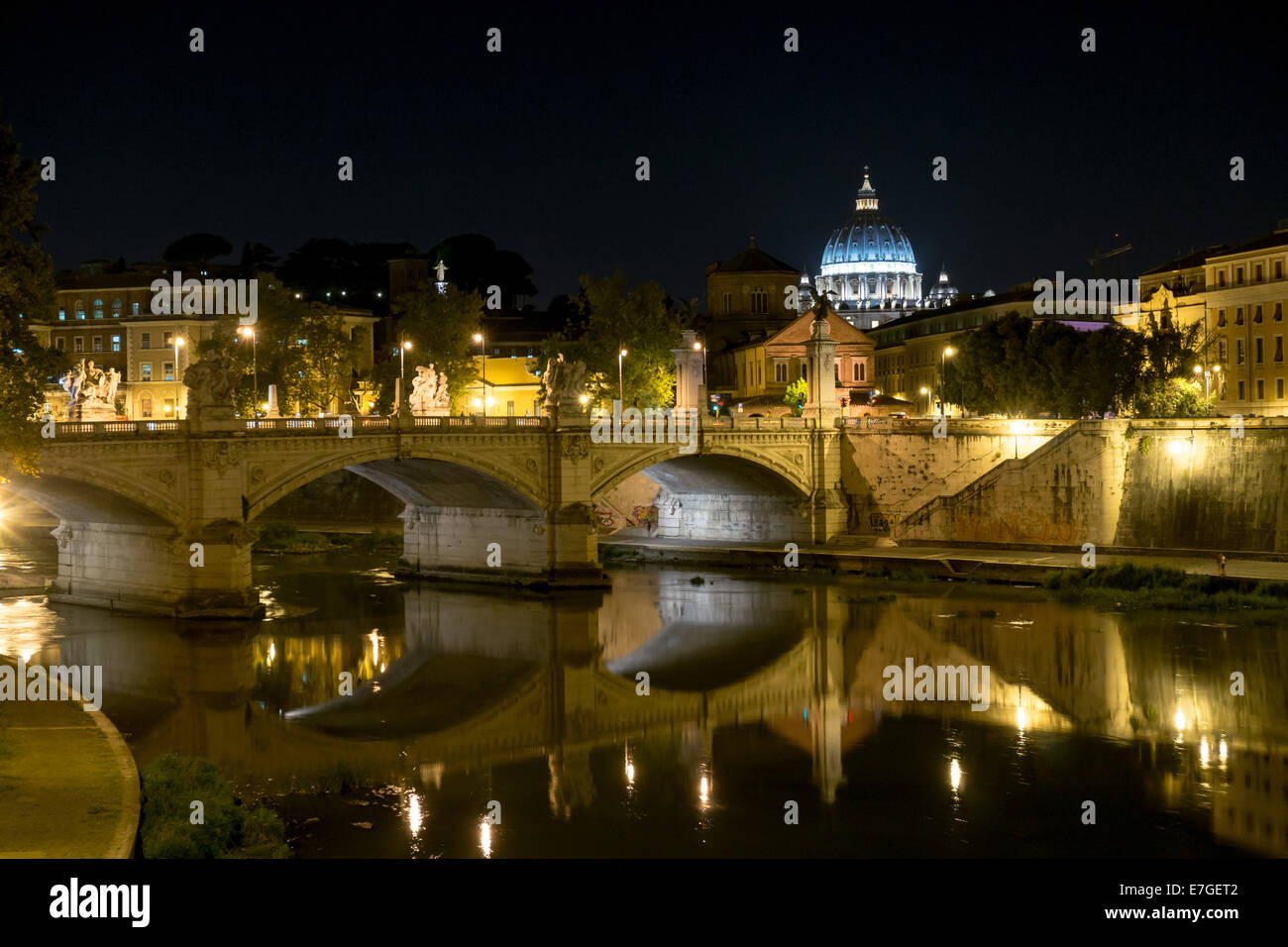 Italy: River Tiber and and St. Peter's Basilica (right) at night. Photo from 5th September 2014. Stock Photo