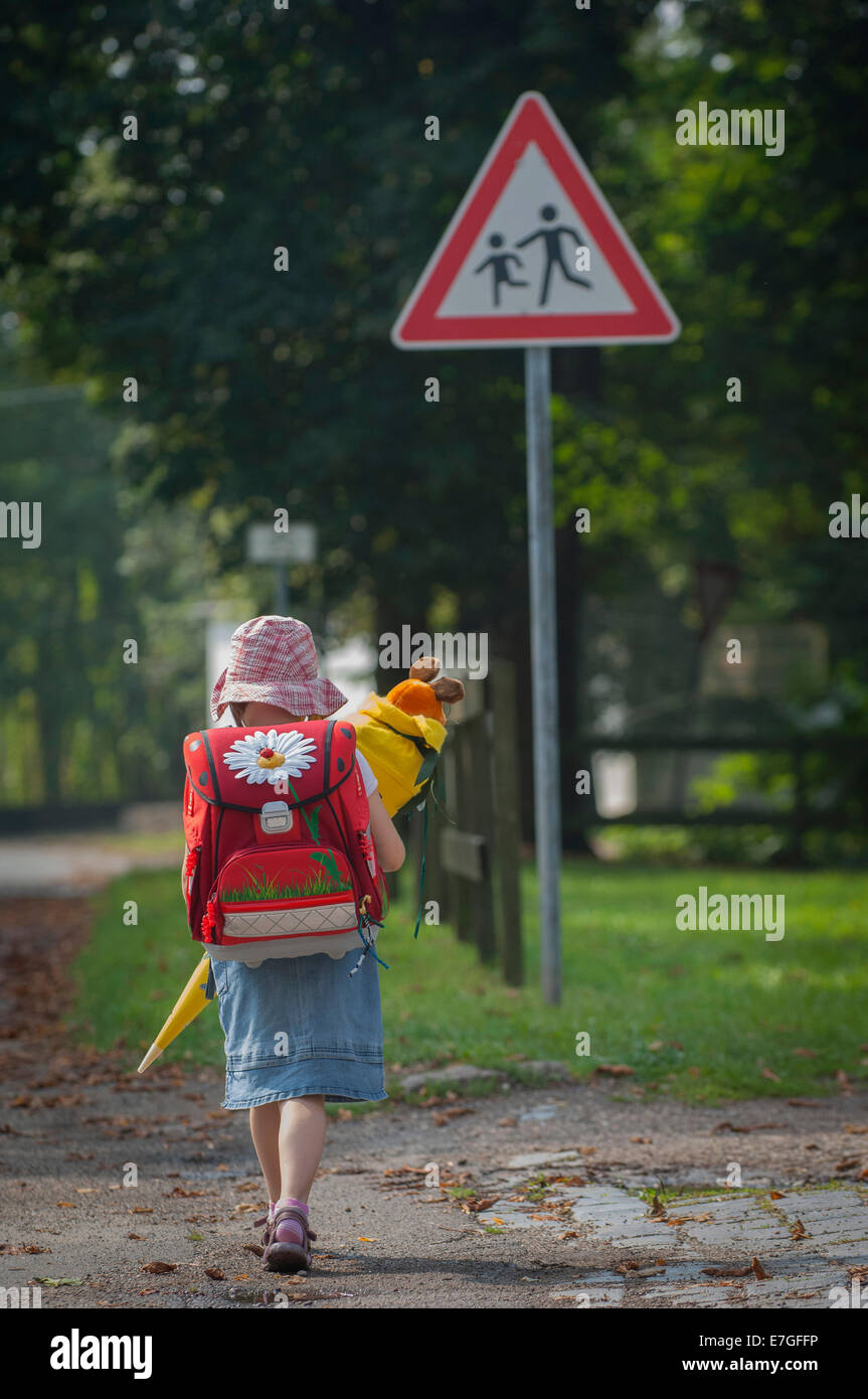 Walking home from her first day at school with her sugar cone in Saxony-Anhalt, Germany. Stock Photo
